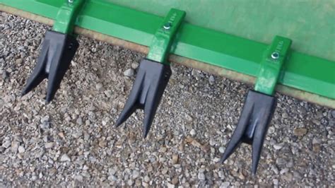 skid steer tooth bar teeth|john deere 1025r tooth bar.